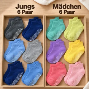 Zwei Holzfächer mit Baby-Anti-Rutsch-Socken: links das Jungen-Set in Grau und Blau, rechts das Mädchen-Set in sechs bunten Farben, jeweils sechs Paar.